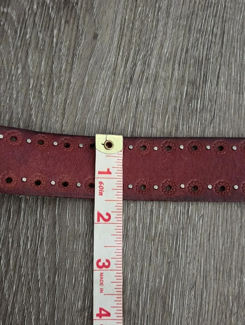 Fossil leather belt